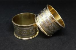 A pair of Victorian Scottish gilded and silver napkin rings with beaded pattern, Glasgow 1872, maker