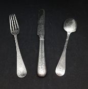 A Victorian three piece child's cutlery set, heavily chased, circa 1899, maker 'G & S Company Ltd'.