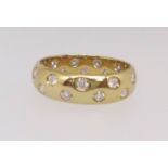 Diamond set band ring, comprising round brilliant cut diamonds scattered throughout in a counter