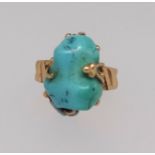 A turquoise matrix dress ring, mounted in abstract yellow gold setting with split yellow gold shank,