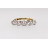 An 18ct antique five stone diamond ring, finger size R.