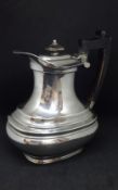 A George V silver coffee pot, height 20cm, approx 21.4oz.