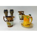 A pair of copper lustre jugs, pair Vienna marked porcelain vases and Burleigh ware jug etc (7).