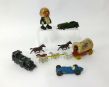 A collection of various plastic figures including German Lone Star also some diecast models