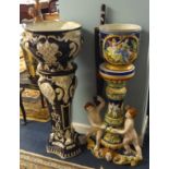 A spelter sculpture table lamp, three decorative jardinière's with pedestals also a large majolica