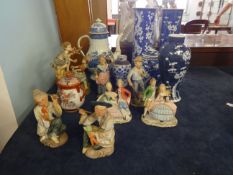 A pair of blue and white vases decorated with blossom tree's oriental baluster vase, a 19th