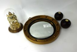 Gilt framed convex mirror, two old bowling balls, German anniversary clock and Victorian