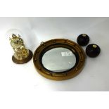 Gilt framed convex mirror, two old bowling balls, German anniversary clock and Victorian