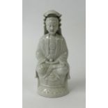 A blanc de chine seated figure, height 18cm.