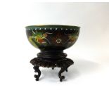 A oriental cloisonné bowl and stand.