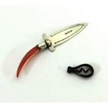 A silver and coral handle page marker and a miniature corkscrew.