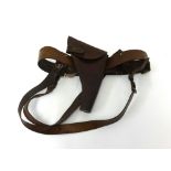 Sam Brown leather belt WWI double strap with pistol pouch, signed 'Pearson E.J.1916'.