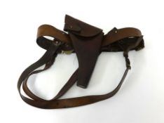 Sam Brown leather belt WWI double strap with pistol pouch, signed 'Pearson E.J.1916'.