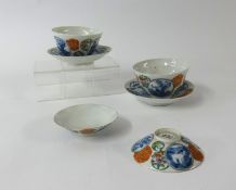 Chinese porcelain tea bowls and dishes six character marks over written and a pair of similar