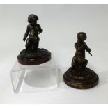 Bronze, a pair of cherub musicians on turned bases, height 10cm.