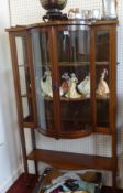 An Edwardian mahogany bow fronted display cabinet with inlay decoration, width 90cm, height approx