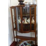 An Edwardian mahogany bow fronted display cabinet with inlay decoration, width 90cm, height approx