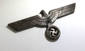 A WWII German metal plaque, width 12cm.