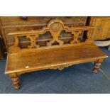 A Victorian carved oak hall bench, length 136cm.