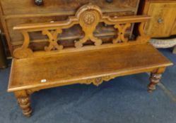 A Victorian carved oak hall bench, length 136cm.