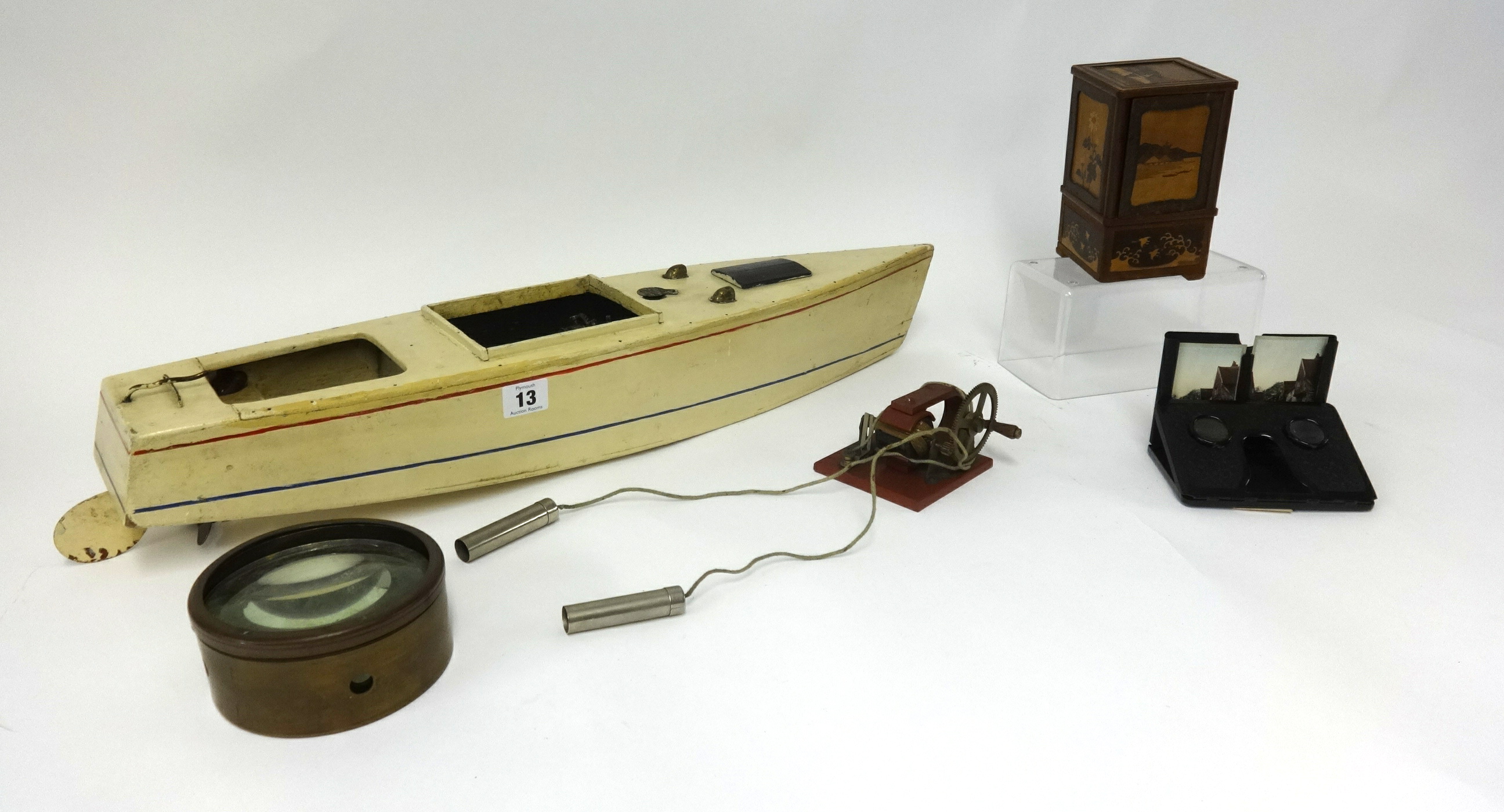 A model Meccano boat, puzzle ball, novelty wood ware, swan fountain pens, boxed card games,