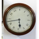 A mahogany dial clock with fusee movement marked 'Hovis Bread Sold Here', with key and pendulum (