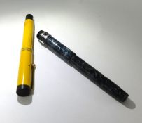 A yellow Parker Canadian Duofold fountain pen and a Conway Stewart 14ct gold nib pen (2).