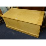 A large antique pine blanket box (stripped), width 106cm, depth 53cm.