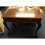 Reproduction mahogany side table with two fitted drawers and two dummy drawers on claw and ball