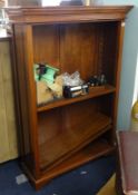 Mahogany free standing open bookcase with adjustable shelves.