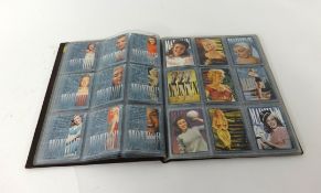 A collection of baseball cards circa 1994, Marilyn Monroe, approx 100.