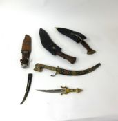 Two kukri knives and various other daggers (8).