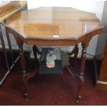 An Edwardian mahogany occasional two tier table.