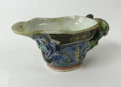 A small Chinese porcelain libation cup, possibly Kangxi, height 50mm.