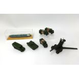 Dinky Toys, collection of military vehicles together with static tanker model on wood plinth.