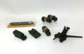 Dinky Toys, collection of military vehicles together with static tanker model on wood plinth.