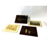 Two oriental lacquered albums with various photographs and prints.