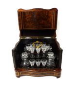 A 19th Century French drink set in burr wood and inlaid cabinet fitted with four decanters and