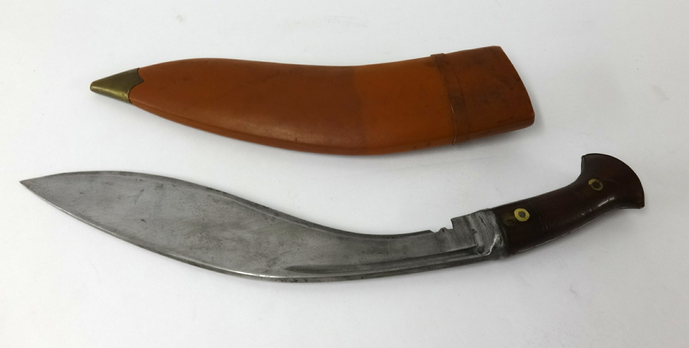 An Army Traders Durrani India 1942 issue kukri knife with modern scabbard.