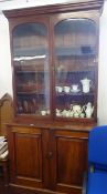 Early 20th Century mahogany library bookcase in two sections.