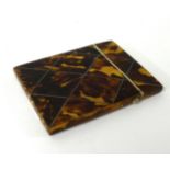 19th Century tortoiseshell and possibly silver inlaid card case, 10cm x 8cm