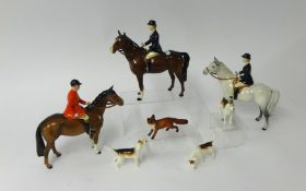 Beswick, a hunt group comprising three mounted horses, seven dogs and a fox (some faults).