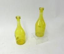 Bristol style glass, a pair of yellow decanter bottles, height 22cm.