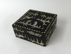 Square oriental box decorated with mother of pearl inlay, 20cm wide.