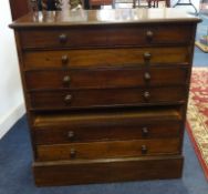 A stained wood collectors cabinet fitted with seven drawers, width 67cm, height 72cm.