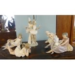 Three Lladro ballerina figures and two Nao figures (5).