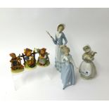 A Lladro figurine, two Nao figures and three Hummel figures (6).