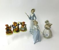 A Lladro figurine, two Nao figures and three Hummel figures (6).