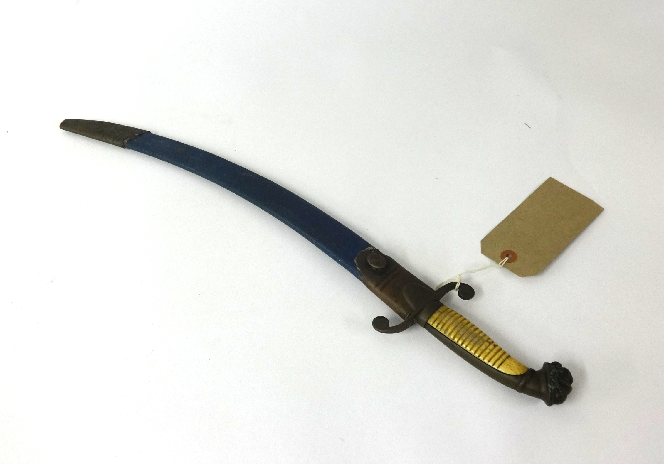 A short sword, stamped W.L & H Stargante?, with brass hilt, curved blade lion head pommel and