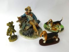 A Capodimonte porcelain figure, Beswick hounds and brass ware.